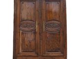 an image of a wooden armoire with two doors on each side