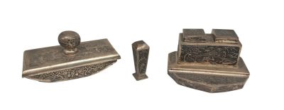 pair of antique silver plated metal items on a white background