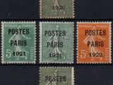 four different postages with different colors and designs on them