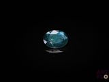 a blue diamond on a black background