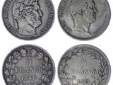 four silver coins with the names of france, france and france on them