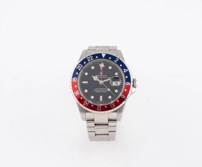 une image d'une montre-bracelet dotée d'une lunette rouge, blanche et bleue