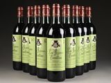 six bottles of red wine are lined up in a row