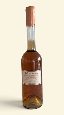 an image of a bottle of wine sitting on top of a table