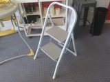 a picture of a small step stool in the corner of a room