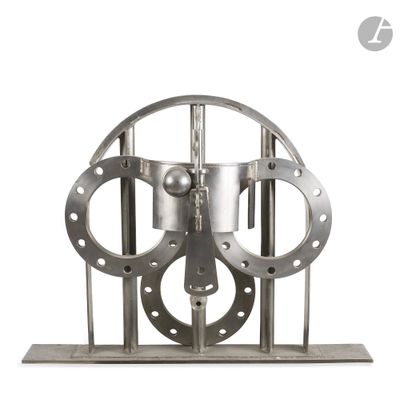 an image of a metal sculpture of a mechanical device