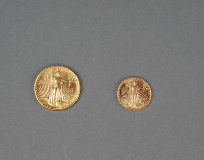 deux pièces d'or sur lesquelles figurent l'effigie d'une femme et d'un homme