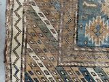 a close up of a rug with a pattern on it