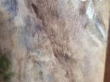 a picture of a painting on a easel with a brush