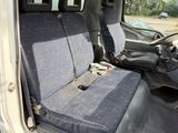 an image of the inside of a truck with the driver ' s seat up