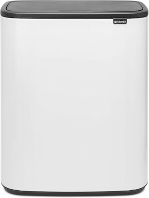 a white and black trash can on a white background