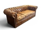 brown leather sofa on white background with clippings on the back