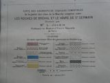 une affiche apposée sur le mur d'un immeuble et sur laquelle figure une carte du pays
