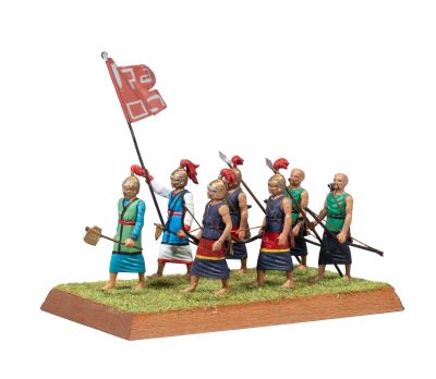 the figurines of a group of people with spears and spears