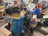 a pile of boxes and other items in a room