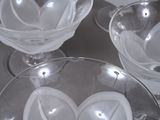 three glasses of water sitting on top of a table