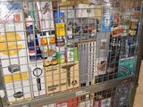 a large metal cart with many items in it