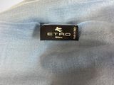 a close up of a label on the back of a shirt