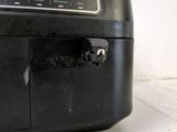 a small black machine that is sitting on a table
