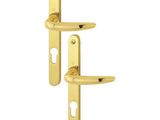a pair of brass door handles on a white background