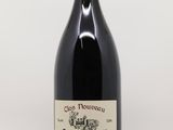 la bouteille de vin rouge est posée sur la table