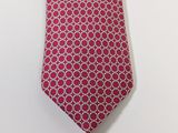 a close up of a tie on a white surface