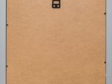 a close up of a cork board with a white frame