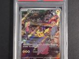 a close up of a pokemon card on a black surface