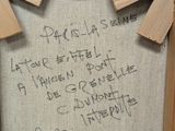 a picture of a wooden frame with writing on it