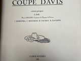 an open book with a drawing of a pair of shoes on top of it