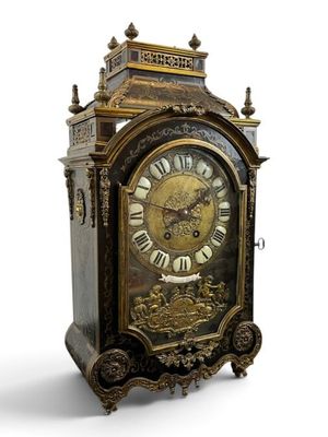 a clock that is sitting on top of a table