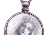 an image of a picture of a woman in a wedding dress is shown in a locke
