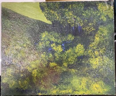 a picture of a painting on a easel that is on a table