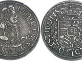 a close up of a coin with a crown on it