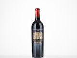 a bottle of red wine sitting on top of a table