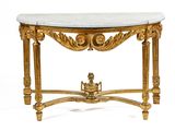 une table console en or avec un plateau en marbre sur fond blanc