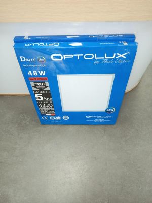 a blue box with a white light inside of it on the floor