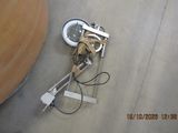 a robot that is sitting on the floor next to a table