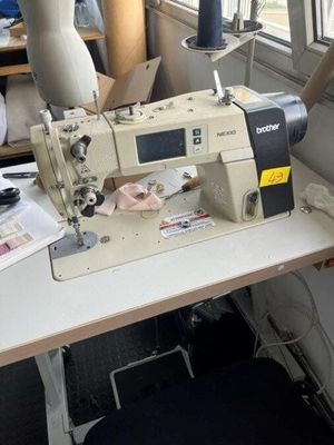 a sewing machine sitting on a table in a room