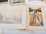 a lot of old books on a table with pictures