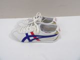 white and blue sneakers with red and blue stripes on them