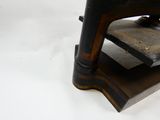 an old sewing machine that is sitting on a table