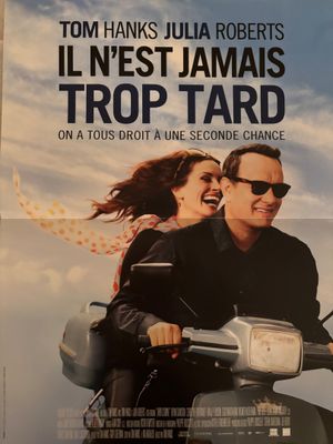 une affiche représentant un homme et une femme à moto