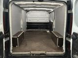 a white van with a bed in the back of it