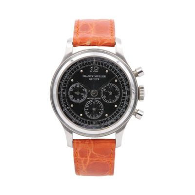 a close up of a watch on a white surface with a white background
