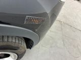 a close up of a car with a sticker on it ' s bumper