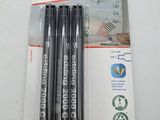 three pens are in a package on a white surface