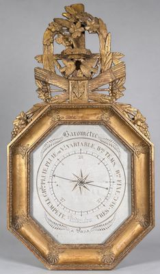 une image représentant une horloge avec un cadre doré et un cadran orné d'un oiseau