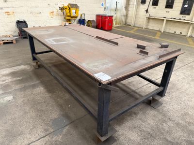 a table that is sitting in the middle of a room