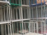 many shelves that have boxes on them in a warehouse